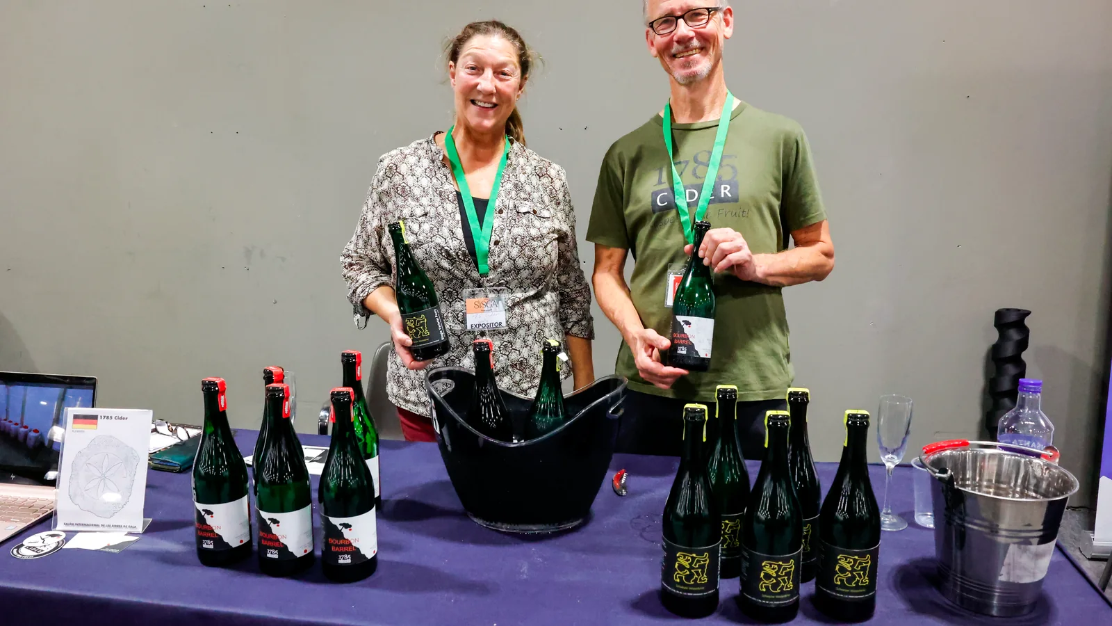Producers serving visitors at their stand during the SISGA Open Tasting